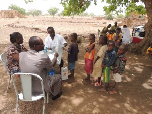 Children in line to provide blood samples for a TAS in Burkina Faso 