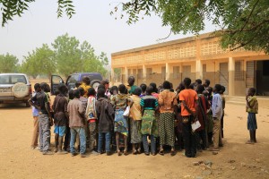 School children in Lioulgou, Burkina Faso answer questions on schistosomiasis (bilharzia). Photo: FHI360